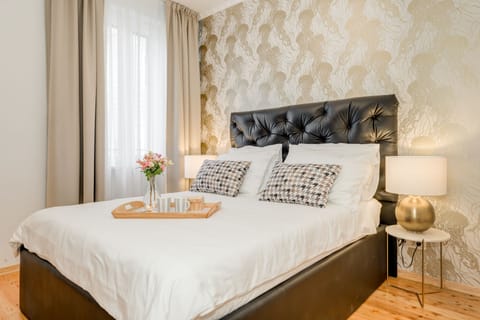 Deluxe Double Room, City View (Medusa) | Minibar, in-room safe, desk, blackout drapes