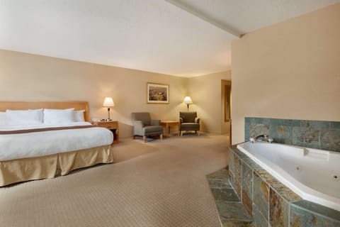 Suite, 1 King Bed, Non Smoking, Hot Tub | In-room safe, desk, iron/ironing board, rollaway beds