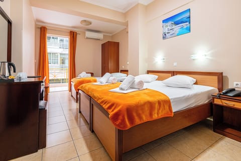 Minibar, desk, blackout drapes, iron/ironing board