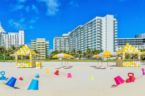 On the beach, sun loungers, beach umbrellas, beach towels