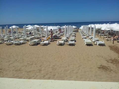 Private beach nearby, white sand, 5 beach bars