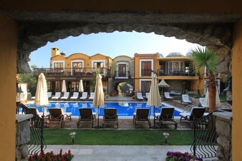 Outdoor pool, open 8:00 AM to 6:30 PM, pool umbrellas, sun loungers