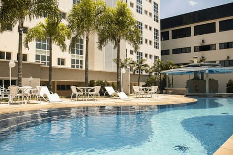 Outdoor pool, open 6:00 AM to 10:00 PM, sun loungers