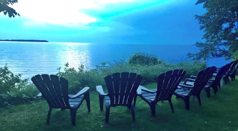 Adirondack chairs await you visit. 