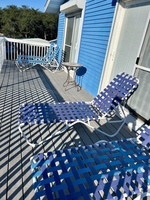 Back Sun Deck- Upstairs that opens to the upstairs bedrooms.