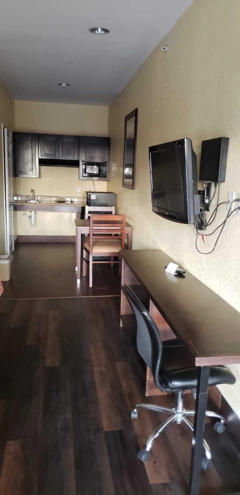 Mini-fridge, microwave, stovetop