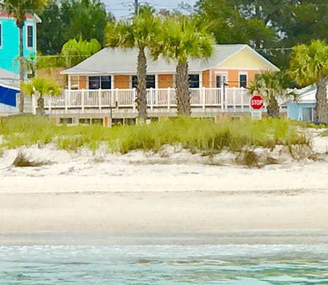 A view of the 2 bedroom balcony from the Gulf water and a more secluded beach