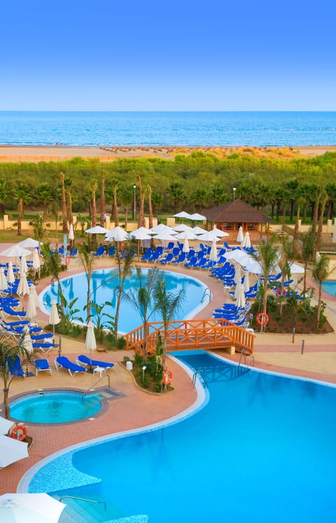 Indoor pool, 2 outdoor pools, pool umbrellas, sun loungers