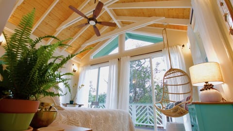Floor to ceiling windows showcase the beautiful native flora. 
