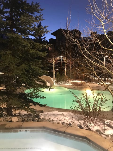 Heated pool and hot tubs at Club Solitude