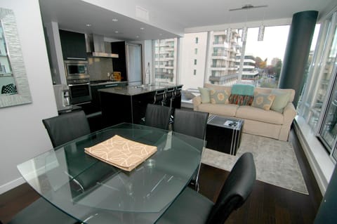 Relaxing open concept living! Wall to wall windows that guests just love!