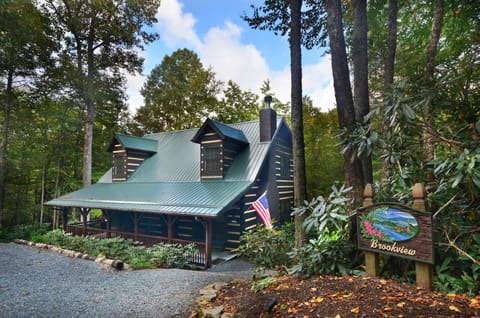 Beautiful log cabin nestled in the woods with its own brook!