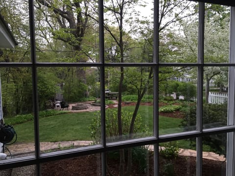 View of fire pit, and barbeque area from the dinning room