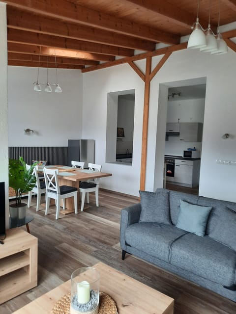 Apartment, 2 Bedrooms, Kitchen, Garden View | Living area | 50-inch flat-screen TV with satellite channels, TV