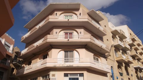 Façade of the building block. Apartment is the one in the middle.