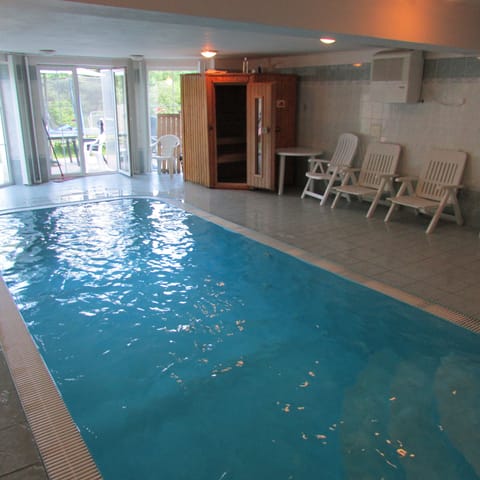 Inside heated and filtrated Pool includes contraflow and massage