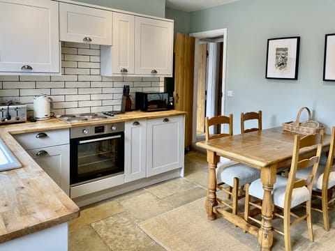 Modern kitchen with dining table