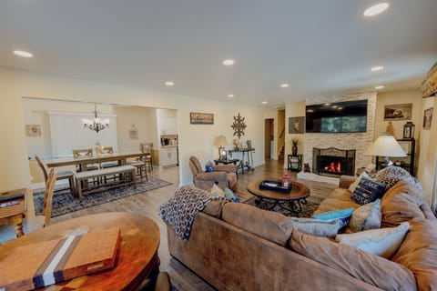 Open floor plan, huge sectional, 85" smart TV, game table, cozy fireplace!!