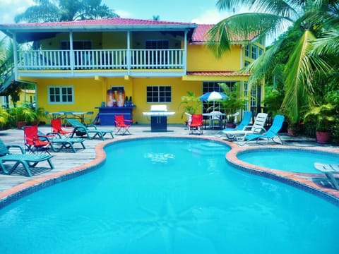 The villa is surrounded by tropical vegetation and the smell of aromatic flowers