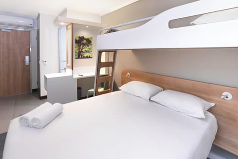 Desk, laptop workspace, free WiFi, bed sheets