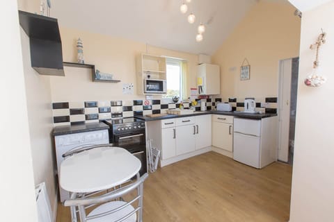 Fully equipped kitchen- washer/dryer, oven, microwave, toaster, fridge,freezer.