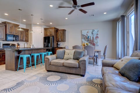 Spacious open concept living area with plenty of seating and natural light