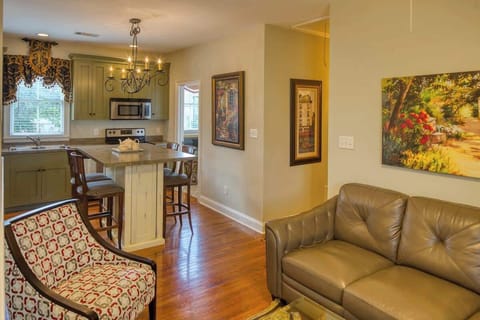 The Washington Square Carriage House is above the 2-car garage with a fully-outfitted kitchen & living room, featured here.