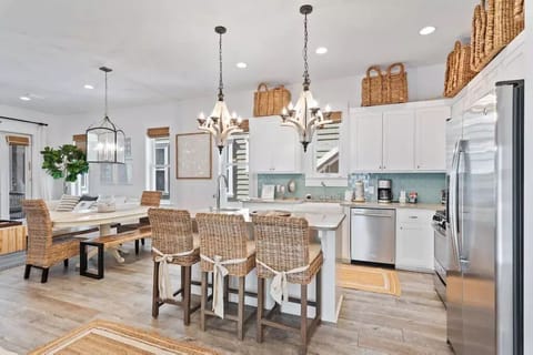 Enormous open concept kitchen, dining and living space. 