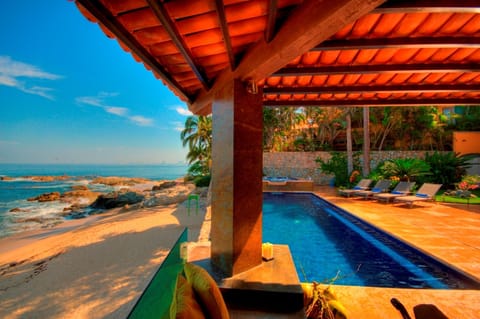 Poolside overlooking pristine Conchas Chinas beach from the Dining Casita