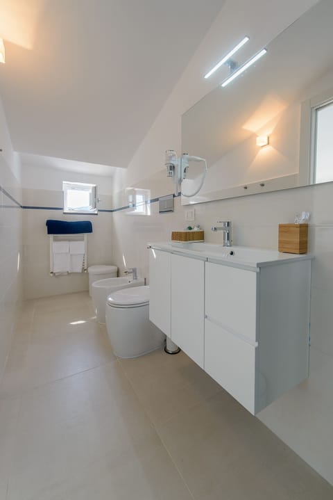 Deluxe Room, Terrace, Sea View (Light Blue) | Bathroom | Shower, free toiletries, hair dryer, slippers