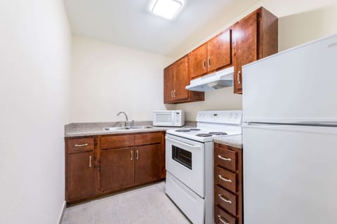 Suite, 1 King Bed with Sofa bed, Non Smoking (Efficiency) | Desk, blackout drapes, iron/ironing board, free WiFi