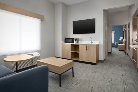 Suite, 1 King Bed | In-room safe, desk, iron/ironing board, cribs/infant beds