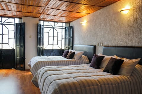 Room, 2 Double Beds | In-room safe, desk, iron/ironing board, free WiFi