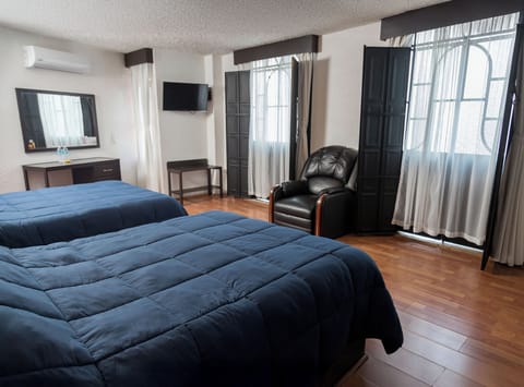 Room, 2 Double Beds | In-room safe, desk, iron/ironing board, free WiFi