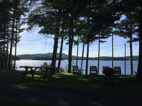 Picnic/sitting area on lawn overlooking lake