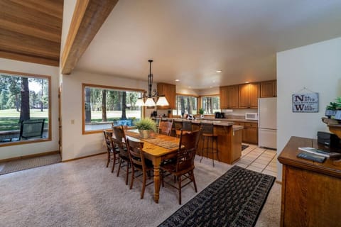 Fully stocked kitchen designed for hearty group meals and game nights. Seating for 8 at the table, plus bar seating.