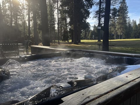 Start your morning (or end your evening) right here. Steam, bubbles, and stunning forest scenery.