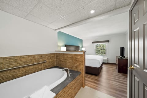 Suite, 1 King Bed, Non Smoking | Desk, iron/ironing board, free cribs/infant beds, rollaway beds