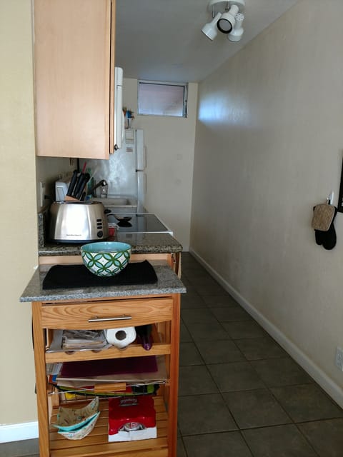 Cart has extra cutting space, wine rack, cozies