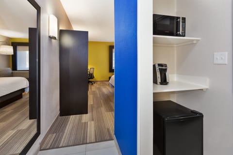 Desk, blackout drapes, iron/ironing board, free cribs/infant beds