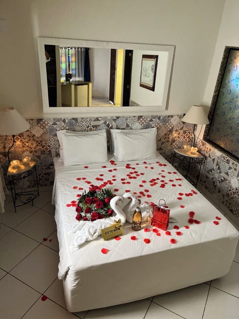 Grand Room, 1 Bedroom, Jetted Tub | Hypo-allergenic bedding, blackout drapes, free WiFi, bed sheets