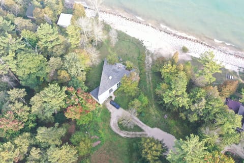 A drone shot of the secluded property and beach!
