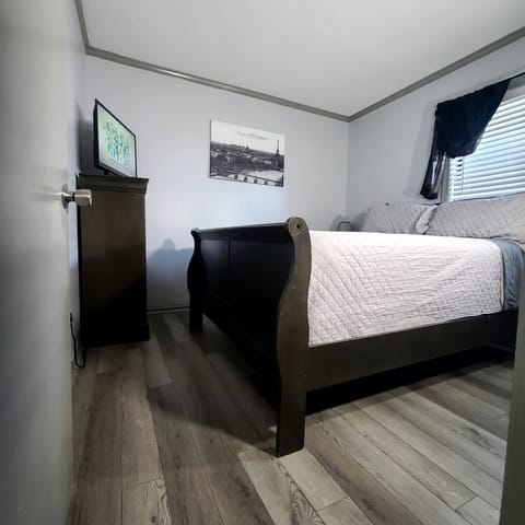 Bedroom w/ 32 in TV