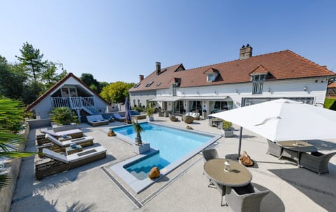 Seasonal outdoor pool, open 10:00 AM to 8:00 PM, sun loungers