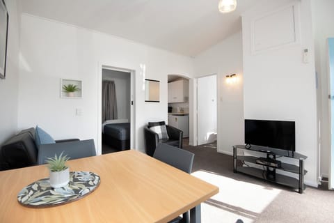 Standard Apartment, 2 Bedrooms | Living area | 30-inch LCD TV with cable channels, TV, streaming services