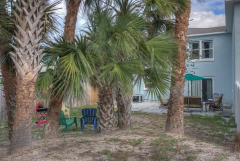 yard chairs, Grill, and hammock ready for your relaxation