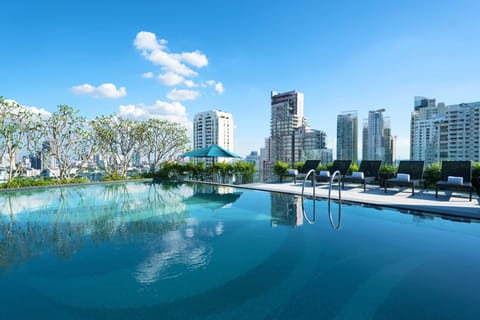 Outdoor pool, open 6 AM to 9 PM, sun loungers