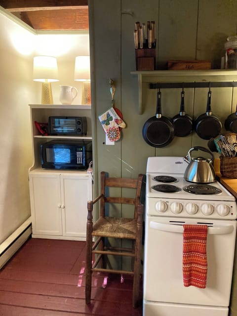 Apartment size stove, microwave and toaster oven.
