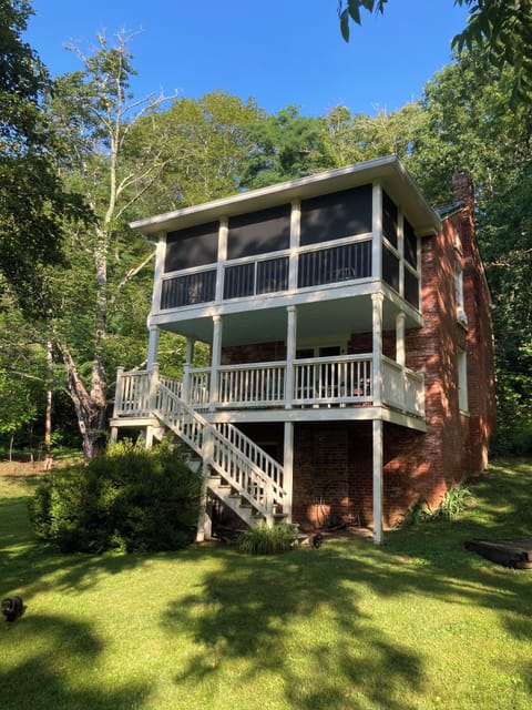 Double back porches with sleeping porch on the top floor.