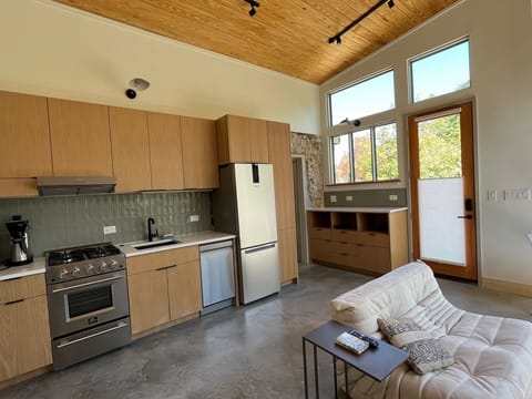 Full kitchen in den.